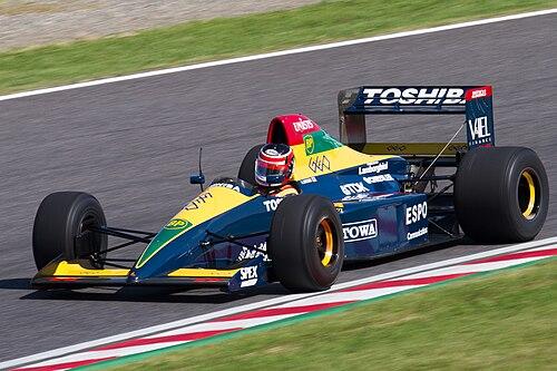 Aguri Suzuki in the 1990 Lola at a demonstration in Japan