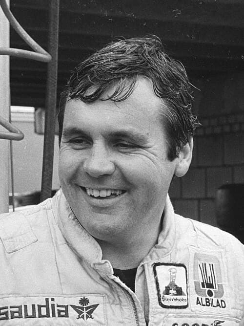 Alan Jones smiling in 1980, the year of his title with Williams